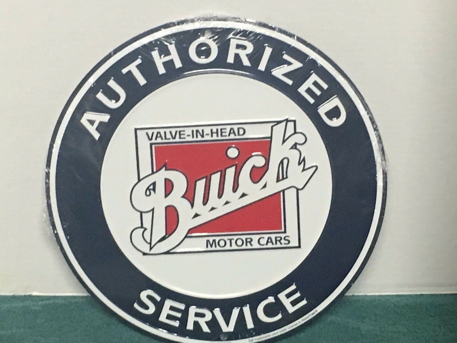 Buick Embossed Metal Sign 12" Round Authorized Service Buick Motor Cars