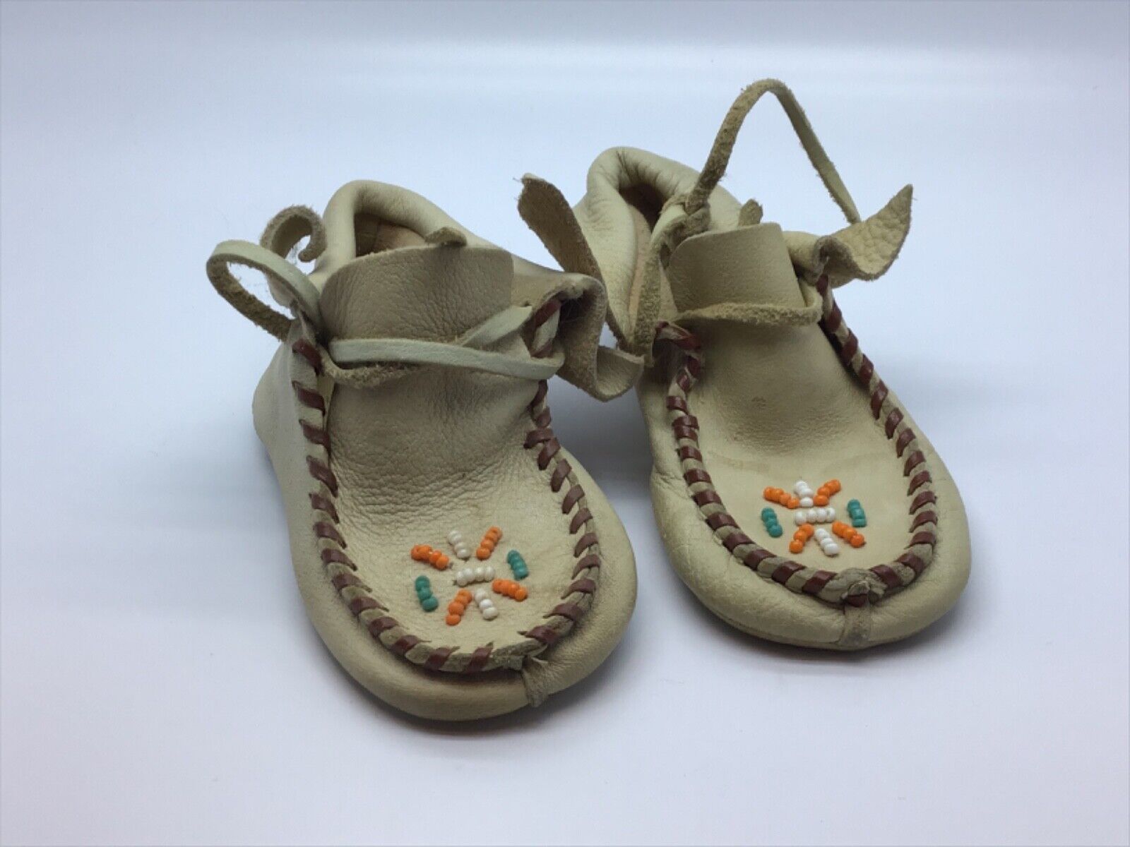 Lot# 2113.  Child’s Leather Beaded Moccasins
